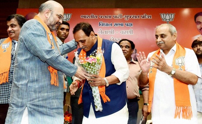 BJP President Amit Shah with Vijay Rupani. (Photo Courtesy: Twitter/@NewIndianXpress)